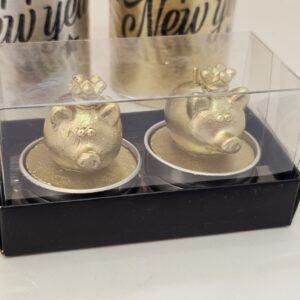 2er-Set goldfarbene Teelichtkerzen mit Schweinchen-Motiv